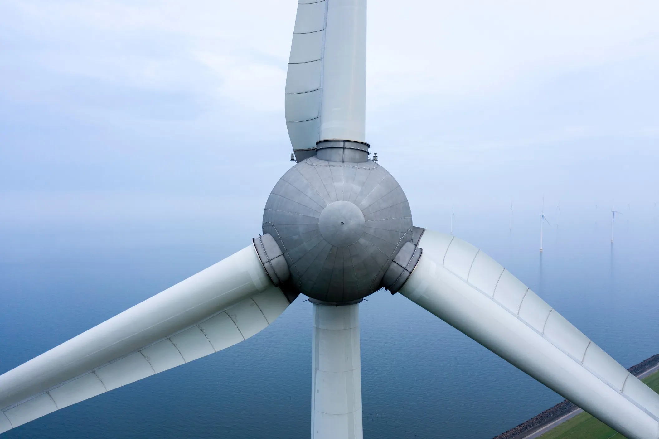 Wind turbine showing scale and precision required in energy sector manufacturing